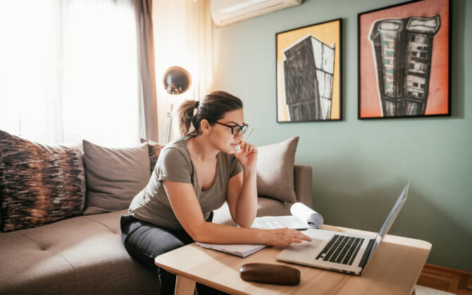 Businesswoman researching low-risk investments