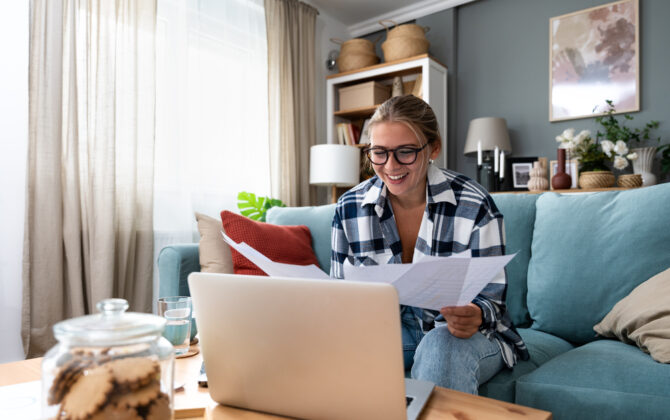 student-loan-borrower-looking-at-laptop